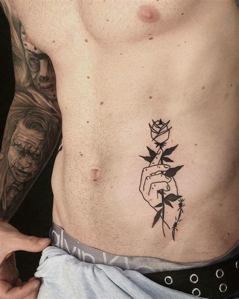 tatuajes debajo del abdomen hombre|25 ideas de tatuajes en el estómago para hombre